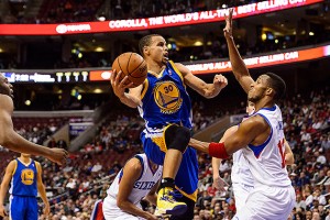 Stephen-Curry-goes-up-and-over-Evan-Turner.-Howard-Smith-USA-TODAY-Sports